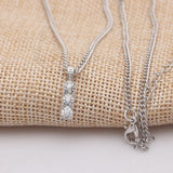 Triple Stone Drop White Topaz Necklace 18K White Gold Plated Pear Iphigenia